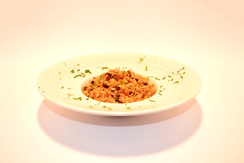 4. Arroz salteado con piñones, pasas y almendras